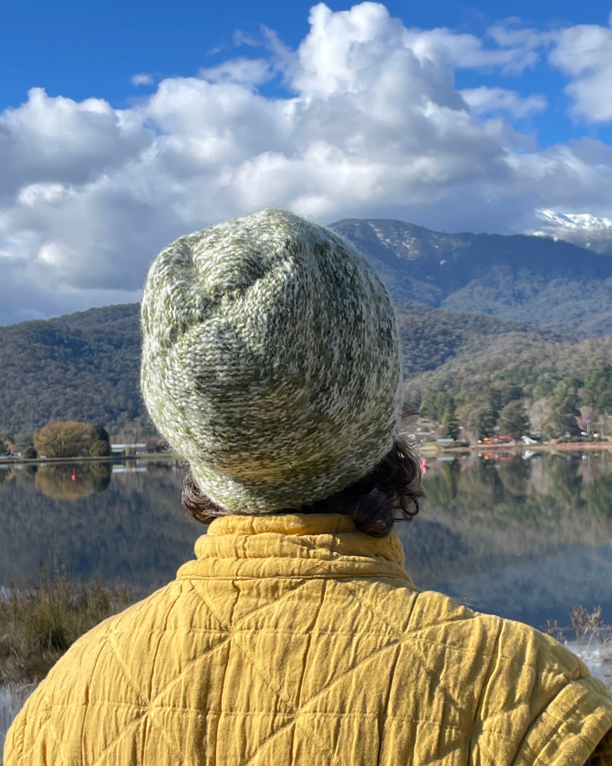 Woman wears fleece lined mohair beanie