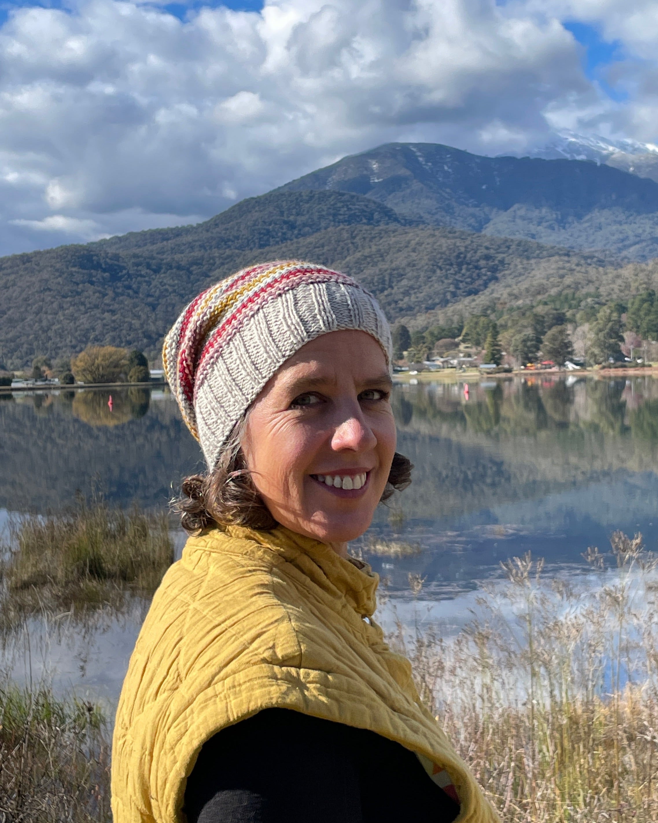 Woman wears slouch Striped merino wool Beanie