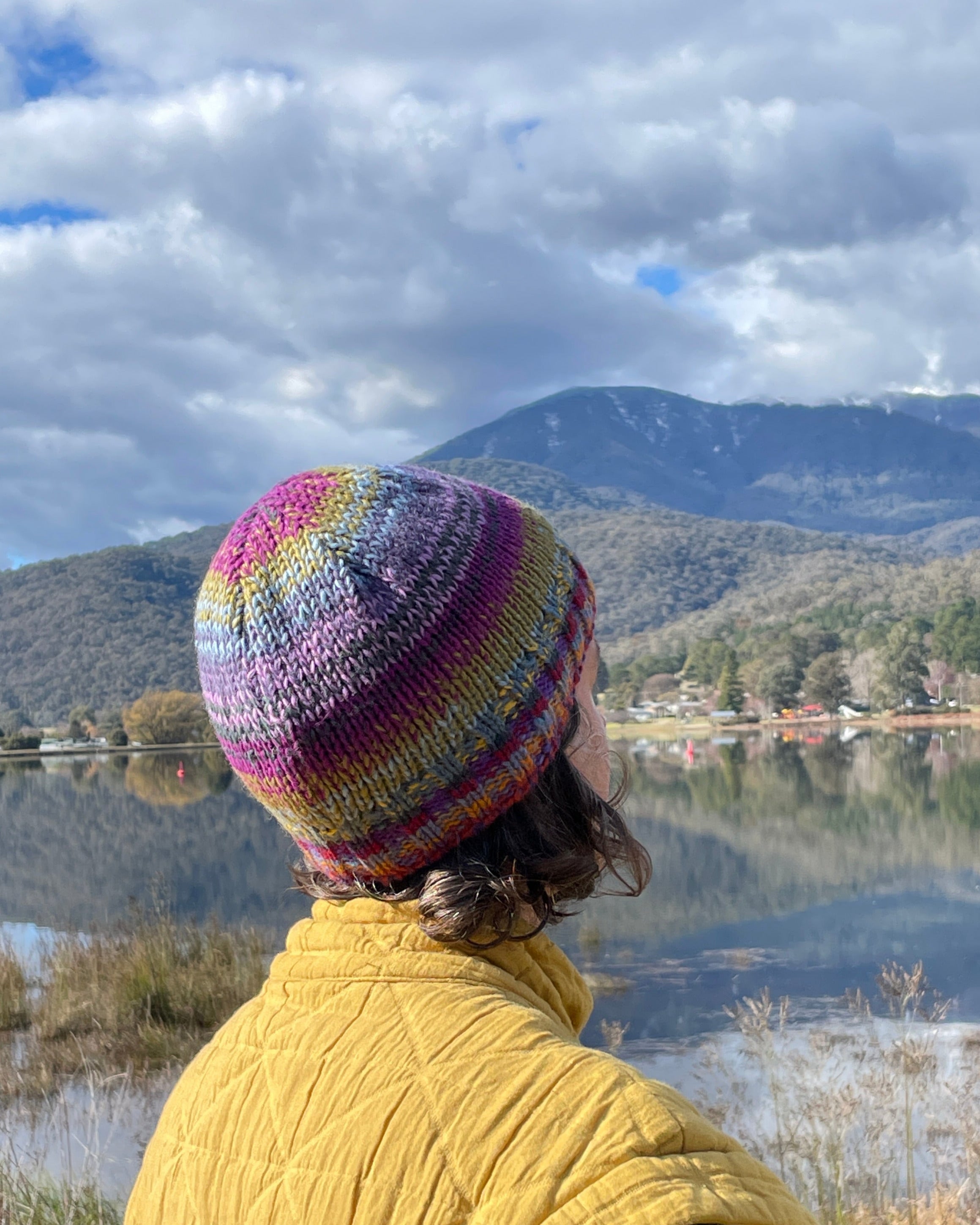 Multi Colour wool beanie on person