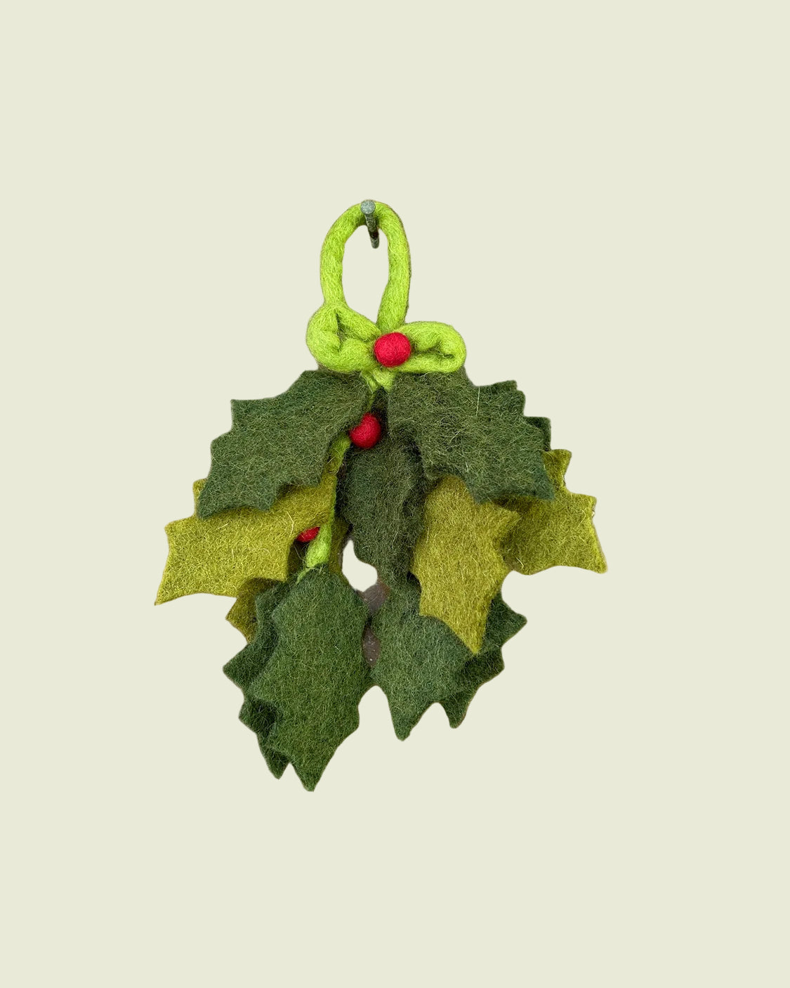 A prig of felt holly