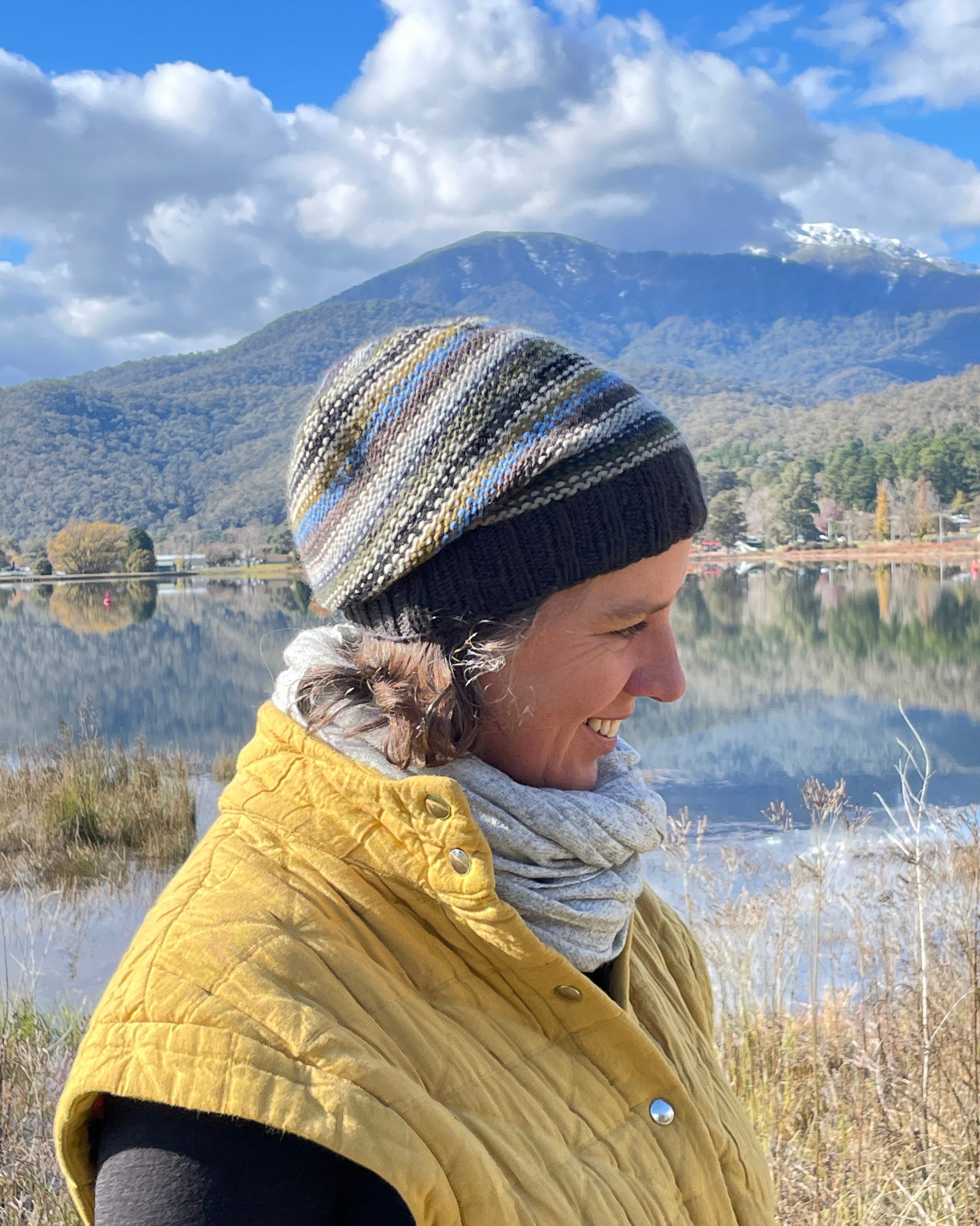 Person wearing Merino Striped Beanie