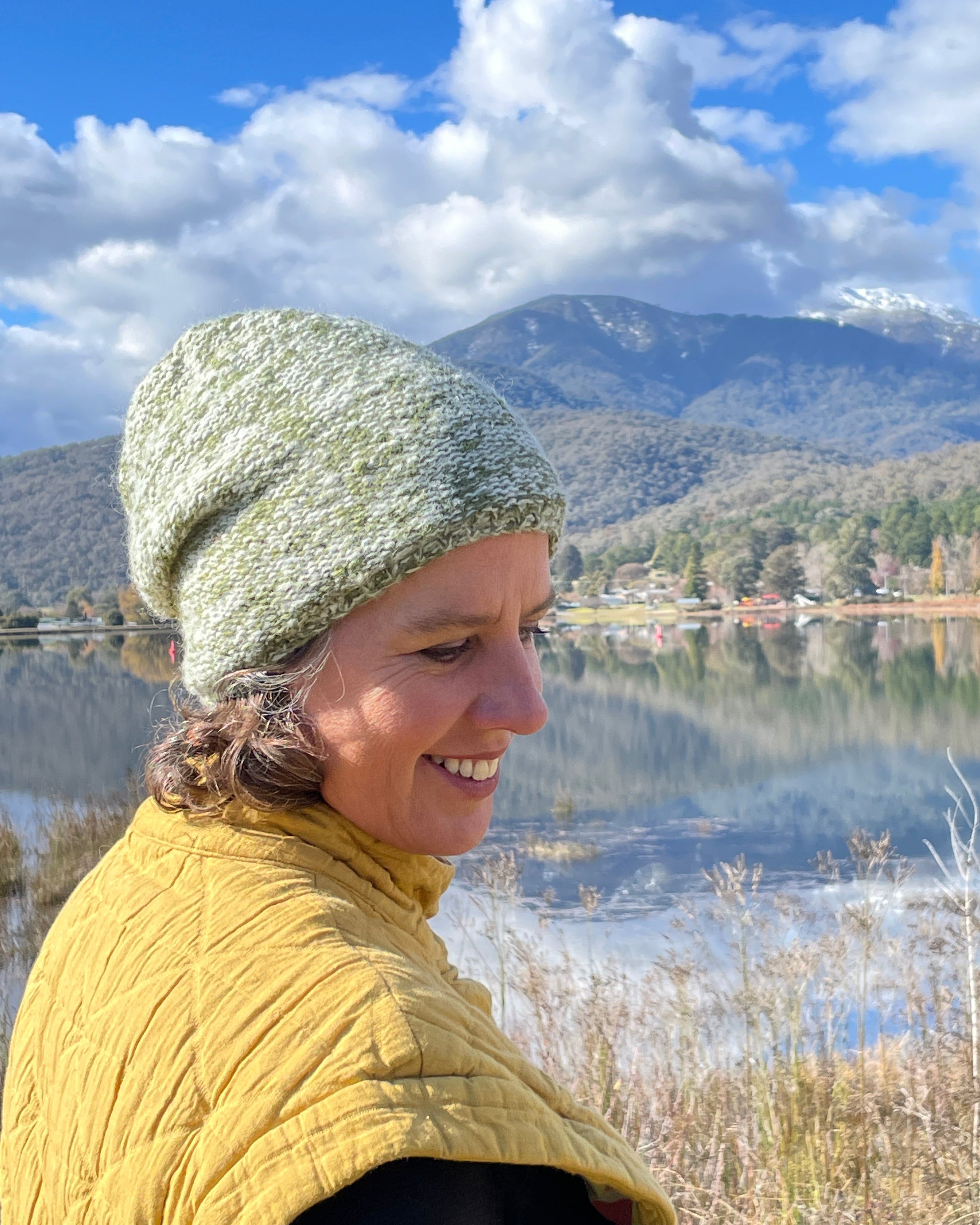 Woman wears fleece lined mohair beanie