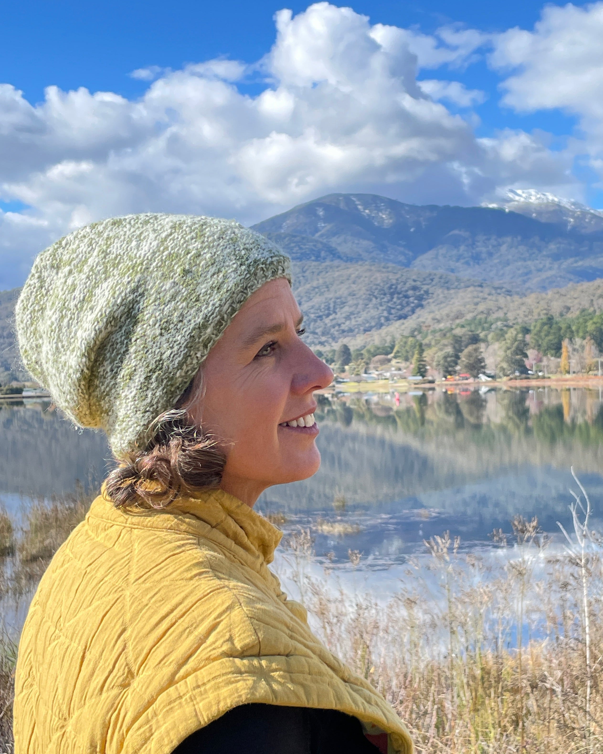 Woman wears fleece lined mohair beanie