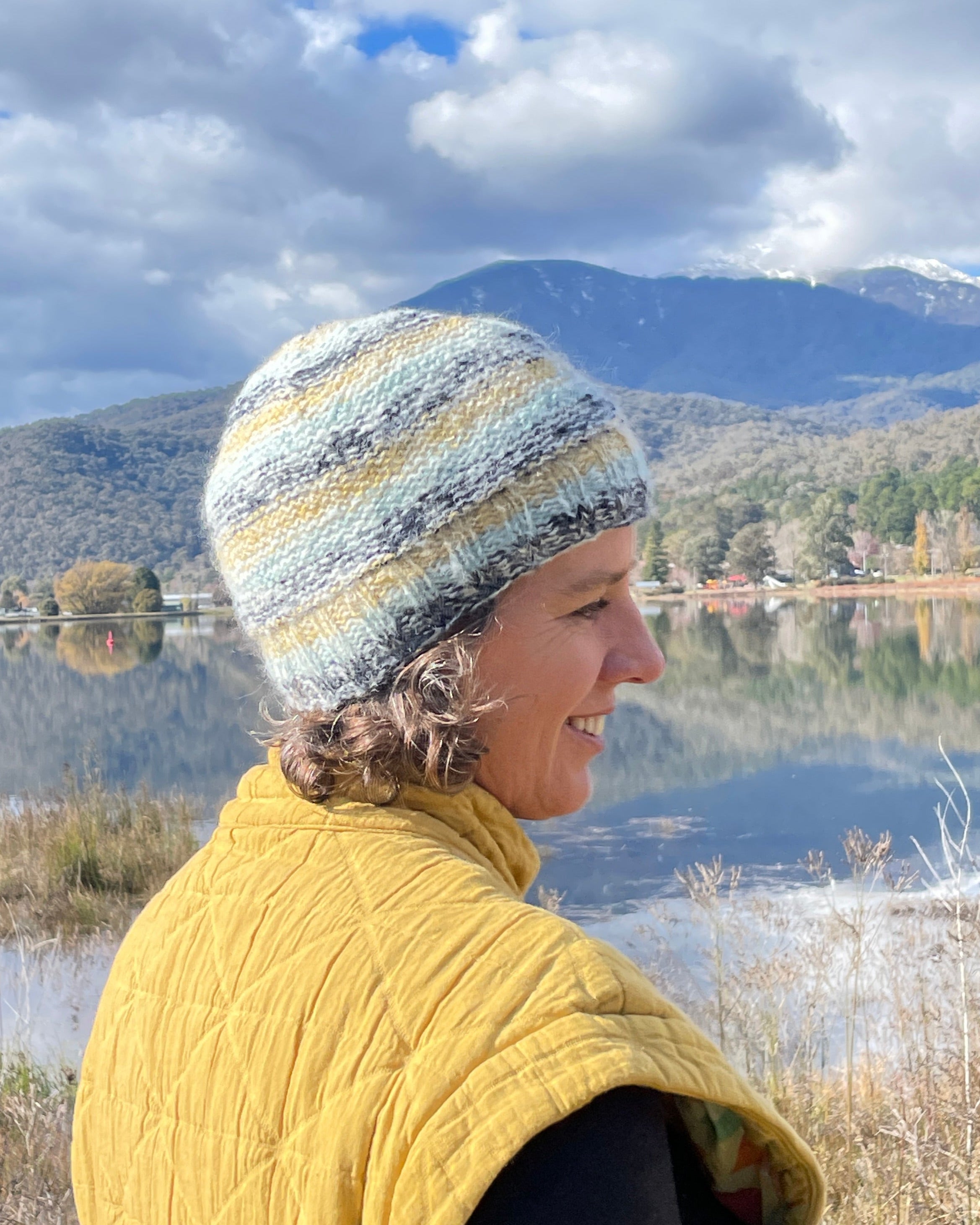 Person Wearing Striped Mohair Fleece Lined Beanie
